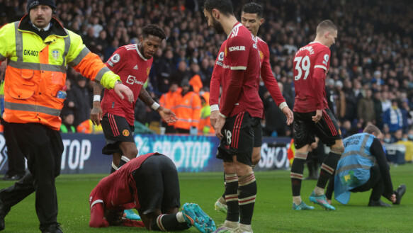 On the ground: Anthony Ilanga went to the ground after hitting an object.  Photo: Lee Smith