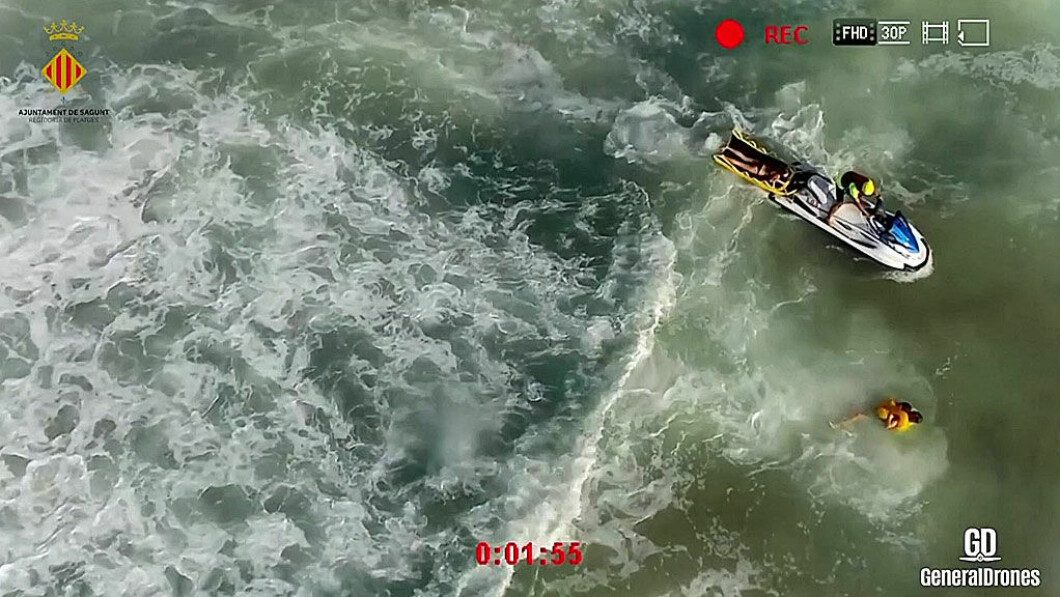 Rescued: A life jacket lowered into the boy from a drone may have saved his life.  Less than two minutes later, lifeguards arrived and took him on a water bike.